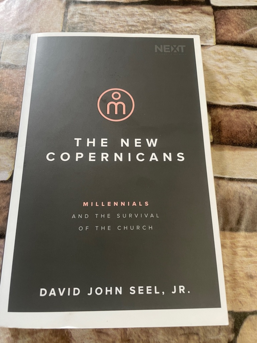 The New Copernicans by David John Seel, Jr. - Black Cover with Coral Accent